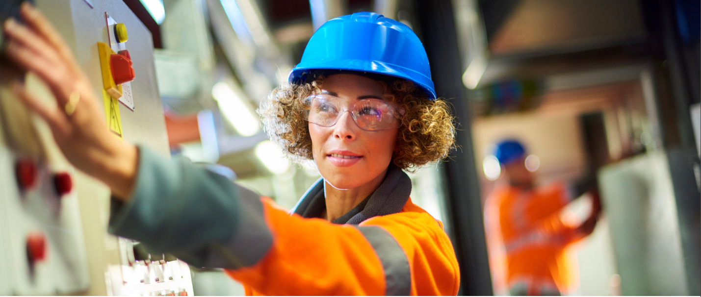 Utility worker female with blue helmet